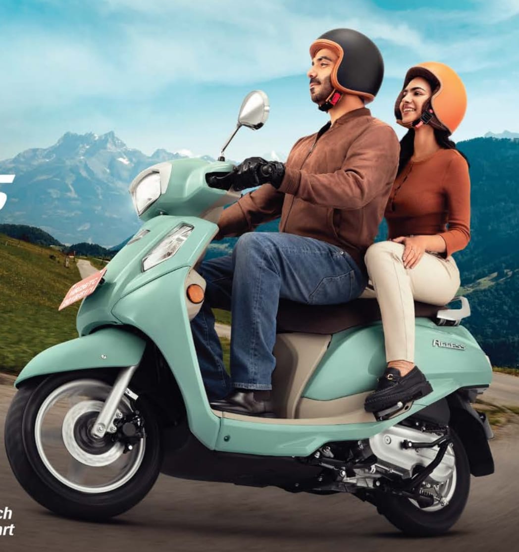 suzuki access 125 at good mileage with less vibration commuting one man one woman