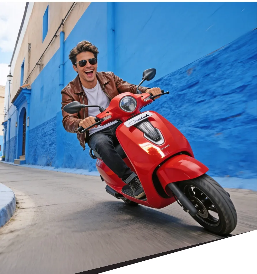 chetak electric scooter high torque one boy riding with smiling